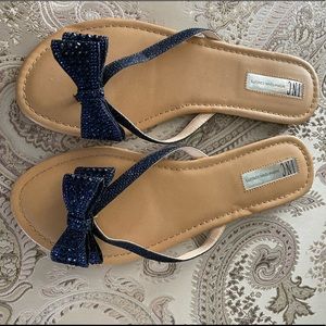 Perfect condition INC flip flops!